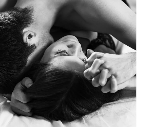 A couple embracing in a black-and-white photograph